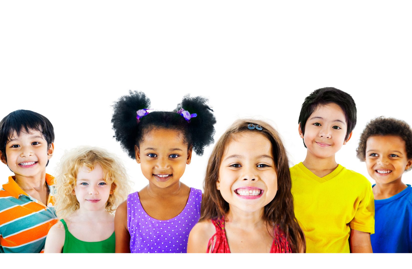 A group of children from different cultural backgrounds all smiling at the camera.